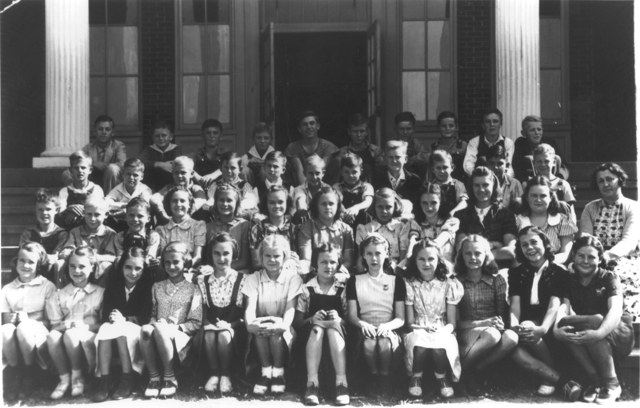 School classmates on the steps.